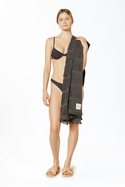 Nude Lucy Nude Classic Beach Towel In A Dark Grey In A Brown Coal Colour 